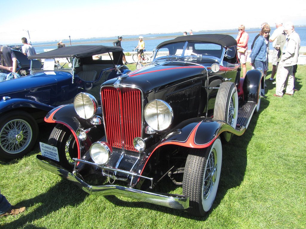 Classic car on a Monterey Peninsula concours lawn